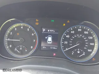 2021 Hyundai Kona SE with VIN KM8K12AA0MU614100, listed as a IAAI auction lot 41924163 with 13,146 mi miles. Bid and sale history available at carsss.com. Image 7.