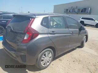 2016 Honda Fit LX z VIN JHMGK5H56GX041075, wystawiony jako IAAI lot #42023299 z przebiegiem 145 658 mil mil oraz . Historia ofert i sprzedaży dostępna na DreamBid. Obrazek 4.
