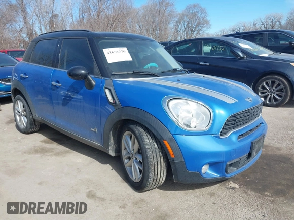 2014 MINI Countryman S with VIN WMWZC5C54EWM17299, listed as a IAAI auction lot 41655370 with 104,264 mi miles and . Bid and sale history available at DreamBid. Image 1.
