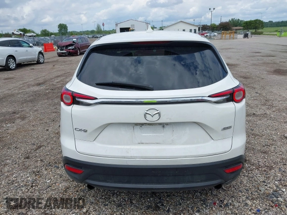 2016 Mazda CX-9 Sport with VIN JM3TCABY4G0100620, listed as a IAAI auction lot 42316216 with 191,245 mi miles and . Bid and sale history available at DreamBid. Image 16.