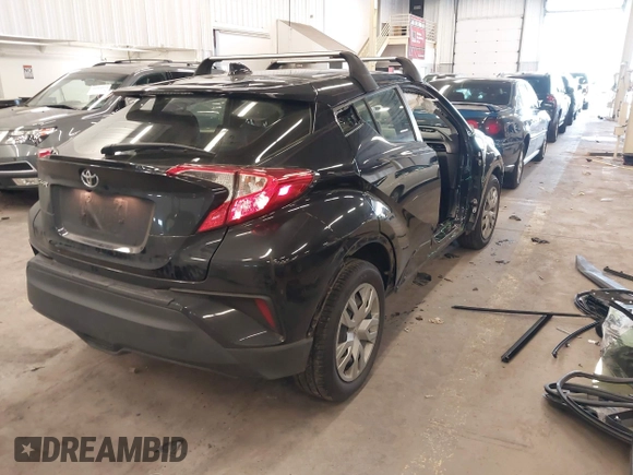 2021 Toyota C-HR LE with VIN JTNKHMBX0M1120864, listed as a IAAI auction lot 41911332 with 37,593 mi miles. Bid and sale history available at carsss.com. Image 4.