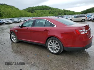 2016 Ford Taurus Limited with VIN 1FAHP2F87GG100532, listed as a Copart auction lot 55512555 with 64,528 mi miles and Salvage title. Bid and sale history available at DreamBid. Image 2.