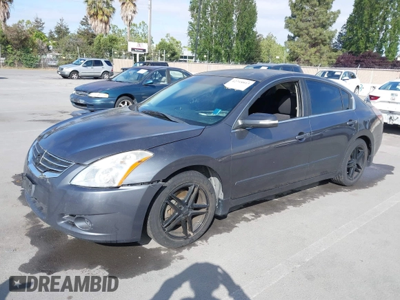 2012 Nissan Altima SR with VIN 1N4BL2AP5CN470612, listed as a IAAI auction lot 42218813 with 153,997 mi miles and . Bid and sale history available at DreamBid. Image 2.
