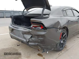 2018 Dodge Charger SXT Plus with VIN 2C3CDXHG0JH217495, listed as a IAAI auction lot 41998783 with 58,247 mi miles and . Bid and sale history available at carsss.com. Image 6.