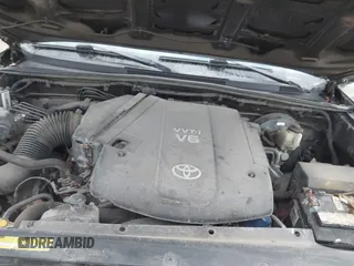 2013 Toyota Tacoma with VIN 5TFUU4EN8DX067539, listed as a IAAI auction lot 41767713 with 156,477 mi miles and . Bid and sale history available at DreamBid. Image 10.