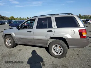 2003 Jeep Grand Cherokee with VIN 1J8GW48N43C593488, listed as a Copart auction lot 60466805 with 70,882 mi miles and Salvage title. Bid and sale history available at DreamBid. Image 2.