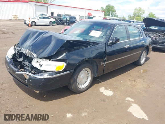 2001 Lincoln Town Car Executive z VIN 1LNHM81W21Y703011, wystawiony jako IAAI lot #42211369 z przebiegiem 188 000 mil mil oraz . Historia ofert i sprzedaży dostępna na DreamBid. Obrazek 18.