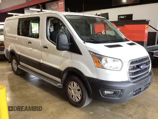 2020 Ford Transit Cargo z VIN 1FTBR1Y8XLKB06141, wystawiony jako IAAI lot #42642640 z przebiegiem 123 417 mil mil oraz . Historia ofert i sprzedaży dostępna na DreamBid. Obrazek 17.