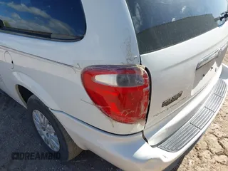2005 Chrysler Town & Country LX with VIN 2C4GP44R75R213048, listed as a IAAI auction lot 42068985 with 100,688 mi miles and . Bid and sale history available at DreamBid. Image 12.