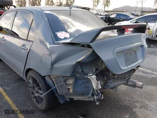 2004 Mitsubishi Lancer ES with VIN JA3AJ26E54U054570, listed as a IAAI auction lot 41592397 with 220,140 mi miles. Bid and sale history available at carsss.com. Image 6.
