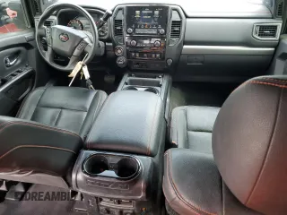 2021 Nissan Titan Pro-4X с VIN 1N6AA1FB7MN512375, выставлен на аукционе Copart как лот 58006765 с пробегом 36 959 миль миль и Списание • Salvage title. История ставок и продаж доступна на DreamBid. Изображение 8.