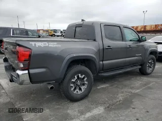 2018 Toyota Tacoma SR5 z VIN 3TMAZ5CN1JM073441, wystawiony jako Copart lot #59153555 z przebiegiem 31 383 mil mil oraz Szkoda całkowita • Salvage title. Historia ofert i sprzedaży dostępna na DreamBid. Obrazek 3.