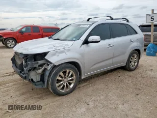 2012 Kia Sorento SX with VIN 5XYKW4A29CG209864, listed as a Copart auction lot 62650175 with 164,088 mi miles and Salvage title. Bid and sale history available at DreamBid. Image 1.