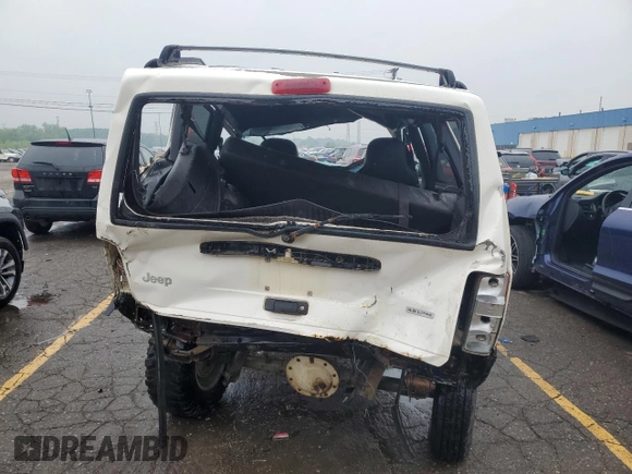 2001 Jeep Cherokee Sport with VIN 1J4FF48S41L611052, listed as a Copart auction lot 59667135 with 270,448 mi miles and Clean title. Bid and sale history available at DreamBid. Image 6.