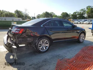 2017 Ford Taurus Limited with VIN 1FAHP2F84HG111702, listed as a Copart auction lot 54694325 with 114,533 mi miles and Salvage Title. Bid and sale history available at DreamBid. Image 3.
