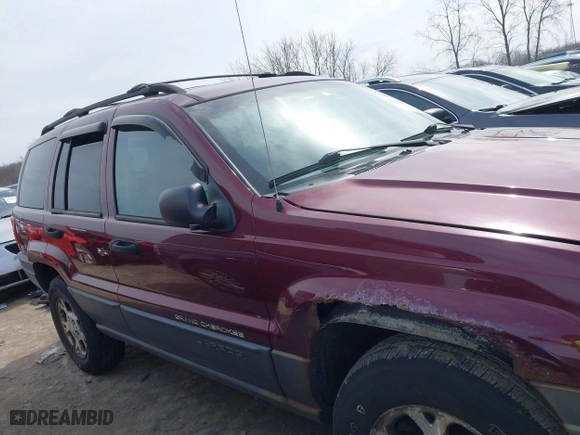 2001 Jeep Grand Cherokee Laredo with VIN 1J4GW48S51C739725, listed as a IAAI auction lot 41800431 with 220,396 mi miles. Bid and sale history available at carsss.com. Image 13.