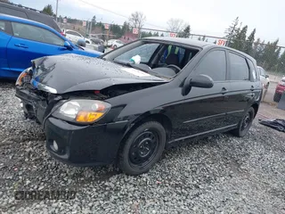 2009 Kia Spectra with VIN KNAFE241795024397, listed as a IAAI auction lot 41828281 with 236,771 mi miles. Bid and sale history available at carsss.com. Image 17.