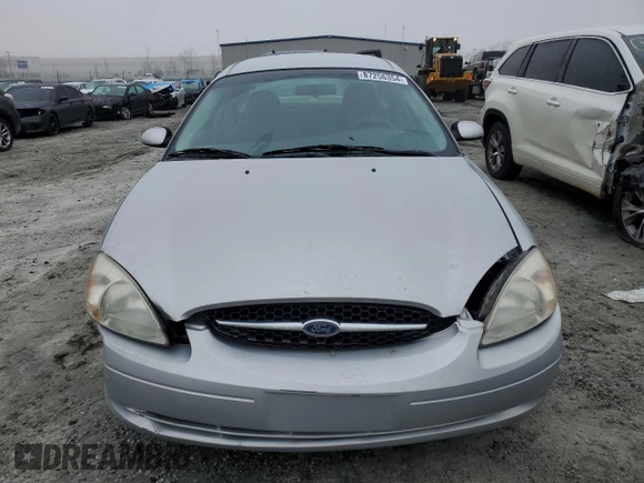 2000 Ford Taurus SE with VIN 1FAFP53U6YA132385, listed as a Copart auction lot 87256354 with 160,109 mi miles and Salvage Title. Bid and sale history available at DreamBid. Image 5.