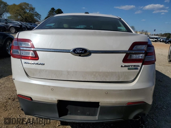 2015 Ford Taurus Limited z VIN 1FAHP2J8XFG123759, wystawiony jako Copart lot #50548205 z przebiegiem 128 266 mil mil oraz Szkoda całkowita • Salvage title. Historia ofert i sprzedaży dostępna na DreamBid. Obrazek 6.