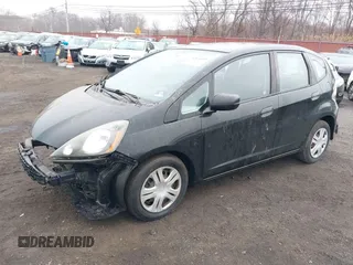 2009 Honda Fit with VIN JHMGE88209S014274, listed as a IAAI auction lot 41826892 with 135,370 mi miles. Bid and sale history available at carsss.com. Image 2.
