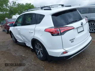 2016 Toyota RAV4 XLE with VIN 2T3RFREV8GW450273, listed as a IAAI auction lot 42281091 with 75,478 mi miles and . Bid and sale history available at DreamBid. Image 3.