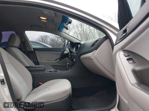2014 Kia Optima LX z VIN KNAGM4A74E5476622, wystawiony jako IAAI lot #41701835 z przebiegiem 193 086 mil mil oraz . Historia ofert i sprzedaży dostępna na DreamBid. Obrazek 5.