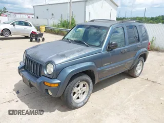 2002 Jeep Liberty Limited with VIN 1J4GL58K92W323210, listed as a IAAI auction lot 42746357 with 225,928 mi miles and . Bid and sale history available at DreamBid. Image 2.