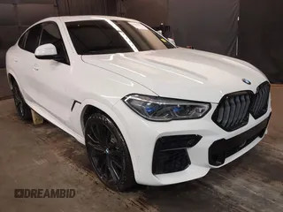 2022 BMW X6 M50i z VIN 5UXCY8C05N9J18577, wystawiony jako IAAI lot #41982042 z przebiegiem 64 155 mil mil oraz . Historia ofert i sprzedaży dostępna na DreamBid. Obrazek 1.