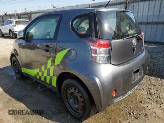 2014 Scion iQ with VIN JTNJJXB0XEJ029610, listed as a Copart auction lot 46700905 with 135,381 mi miles and Salvage title. Bid and sale history available at DreamBid. Image 2.