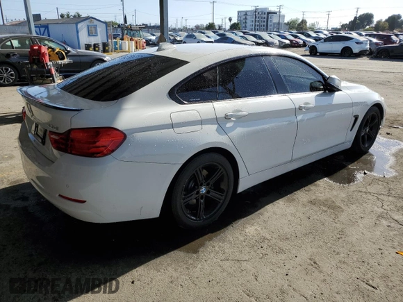2015 BMW 4 Series 428i with VIN WBA4A9C5XFGL85882, listed as a Copart auction lot 57434445 with 145,765 mi miles and Salvage title. Bid and sale history available at DreamBid. Image 3.