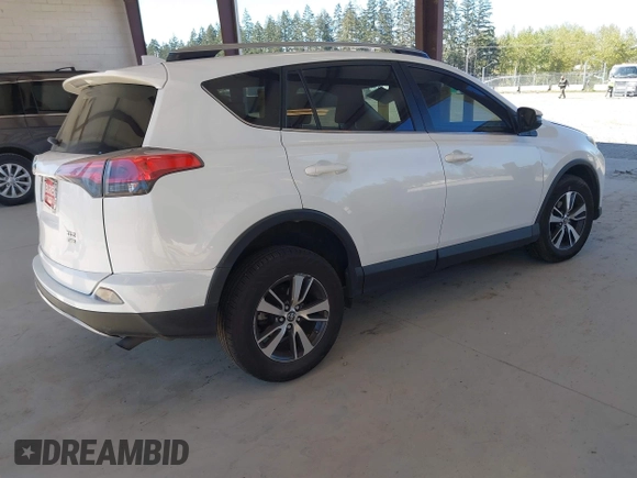 2018 Toyota RAV4 XLE with VIN JTMRFREVXJD240388, listed as a IAAI auction lot 42052065 with 117,114 mi miles. Bid and sale history available at carsss.com. Image 4.