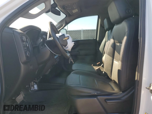2021 Chevrolet Silverado 1500 Work Truck with VIN 1GCRYAEF4MZ331779, listed as a Copart auction lot 46589905 with 97,701 mi miles and Salvage Title. Bid and sale history available at DreamBid. Image 7.