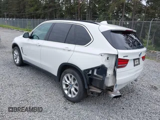 2016 BMW X5 xDrive40e z VIN 5UXKT0C55G0S77047, wystawiony jako IAAI lot #42224623 z przebiegiem 102 611 mil mil oraz . Historia ofert i sprzedaży dostępna na DreamBid. Obrazek 3.