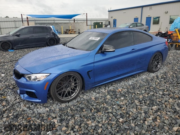 2014 BMW 4 Series 435i xDrive with VIN WBA3R5C50EK187272, listed as a Copart auction lot 56579855 with 129,873 mi miles and Salvage title. Bid and sale history available at DreamBid. Image 1.