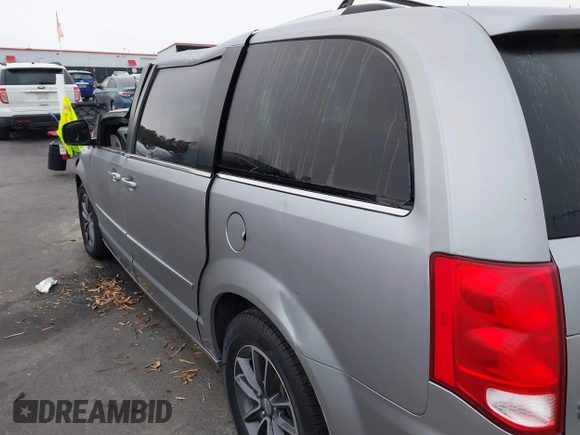 2017 Dodge Grand Caravan SXT with VIN 2C4RDGCG9HR677157, listed as a IAAI auction lot 41470342 with 66,611 mi miles and . Bid and sale history available at DreamBid. Image 18.