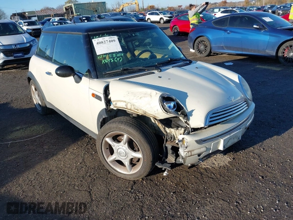 2004 MINI Hardtop with VIN WMWRC33464TJ58388, listed as a IAAI auction lot 40827409 with 102,322 mi miles and . Bid and sale history available at DreamBid. Image 6.