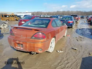 2004 Pontiac Grand Am GT with VIN 1G2NW12E94C157702, listed as a IAAI auction lot 41642443 with 189,176 mi miles. Bid and sale history available at carsss.com. Image 4.