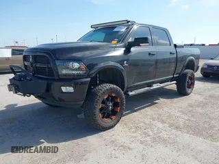 2015 Ram 2500 Laramie with VIN 3C6UR5FL2FG614985, listed as a IAAI auction lot 42031528 with 248,421 mi miles and . Bid and sale history available at DreamBid. Image 2.