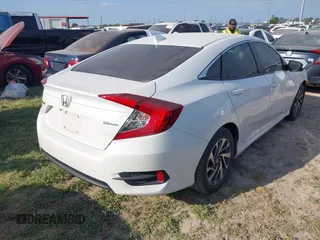 2018 Honda Civic EX with VIN 19XFC2F7XJE039026, listed as a IAAI auction lot 41963886 with 71,011 mi miles and . Bid and sale history available at DreamBid. Image 4.