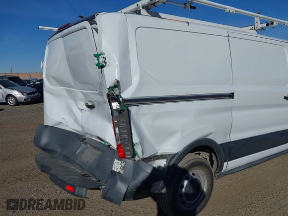 2016 Ford Transit Cargo z VIN 1FTYE1YM2GKB18602, wystawiony jako IAAI lot #41091180 z przebiegiem 143 262 mil mil oraz . Historia ofert i sprzedaży dostępna na DreamBid. Obrazek 6.