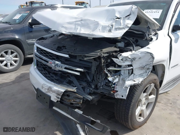 2018 Chevrolet Tahoe LT with VIN 1GNSCBKC0JR193421, listed as a IAAI auction lot 41241454 with 115,663 mi miles. Bid and sale history available at carsss.com. Image 6.