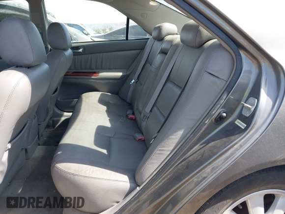 2004 Toyota Camry LE with VIN 4T1BF30K24U569209, listed as a IAAI auction lot 41988665 with 191,017 mi miles. Bid and sale history available at carsss.com. Image 8.