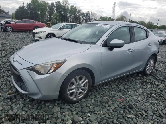 2018 Toyota Yaris with VIN 3MYDLBYV2JY329621, listed as a Copart auction lot 52351815 with 127,195 mi miles and Salvage Title. Bid and sale history available at DreamBid. Image 1.
