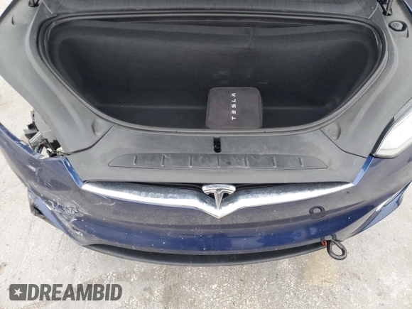 2020 Tesla Model X Long Range with VIN 5YJXCBE2XLF250234, listed as a Copart auction lot 42236365 with 63,401 mi miles and Non Repairable. Bid and sale history available at carsss.com. Image 12.