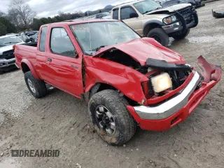 1999 Nissan Frontier XE with VIN 1N6ED26Y4XC313142, listed as a Copart auction lot 85777354 with 122,822 mi miles and Salvage title. Bid and sale history available at DreamBid. Image 4.