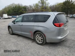 2021 Chrysler Voyager LXi with VIN 2C4RC1DG0MR521145, listed as a Copart auction lot 48062405 with 144,197 mi miles and Salvage Title. Bid and sale history available at DreamBid. Image 2.