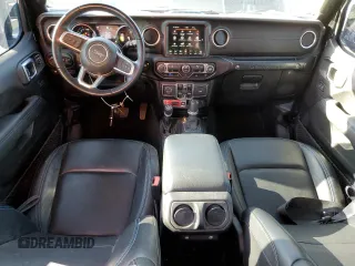2022 Jeep Wrangler Unlimited Rubicon with VIN 1C4JJXR64NW198894, listed as a Copart auction lot 49899255 with 25,120 mi miles and Salvage title. Bid and sale history available at DreamBid. Image 8.