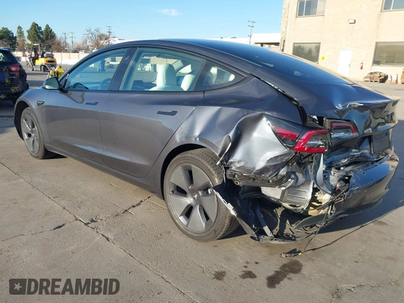 2022 Tesla Model 3 Long Range with VIN 5YJ3E1EB4NF293635, listed as a IAAI auction lot 41388234 with 28,396 mi miles and . Bid and sale history available at DreamBid. Image 3.