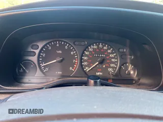 1999 Ford Contour SE Fleet z VIN 1FAFP66L2XK149217, wystawiony jako Copart lot #79546104 z przebiegiem 231 245 mil mil oraz Tytuł czysty. Historia ofert i sprzedaży dostępna na DreamBid. Obrazek 8.