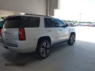 2019 Chevrolet Tahoe LT with VIN 1GNSCBKC0KR240660, listed as a IAAI auction lot 42265044 with 109,720 mi miles and . Bid and sale history available at DreamBid. Image 4.